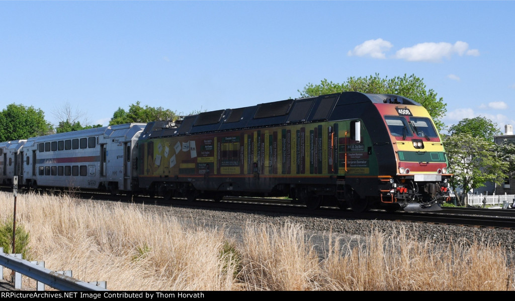  NJT 4508 with its Black History Month wrap leads NJT train 5431